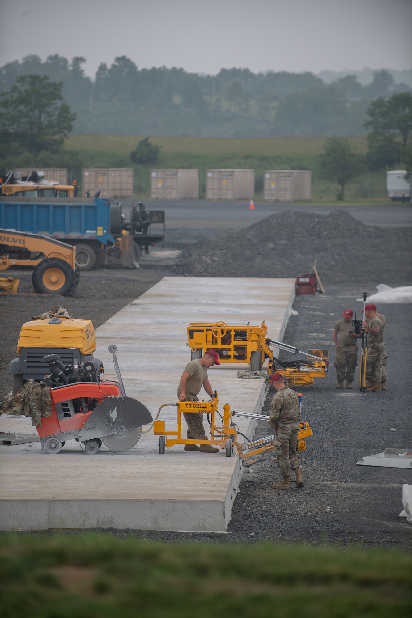 Airmen from various civil engineering specialties construct a Rapid Airfield Damage Repair system at Fort Indiantown Gap, Pennsylvania, June 7, 2025.