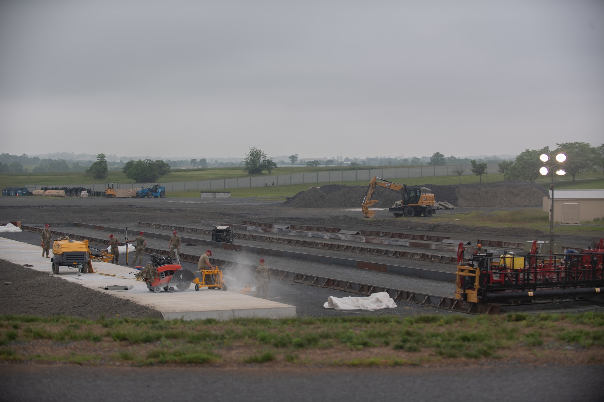 Airmen from various civil engineering specialties construct a Rapid Airfield Damage Repair system at Fort Indiantown Gap, Pennsylvania, June 7, 2025.
