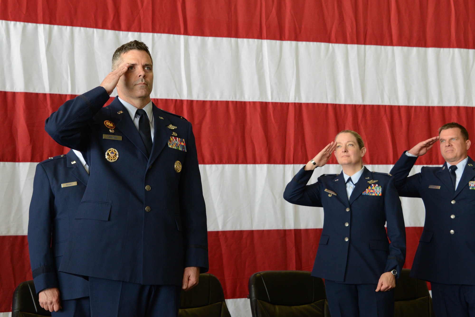 Col. Adam Carlson salutes