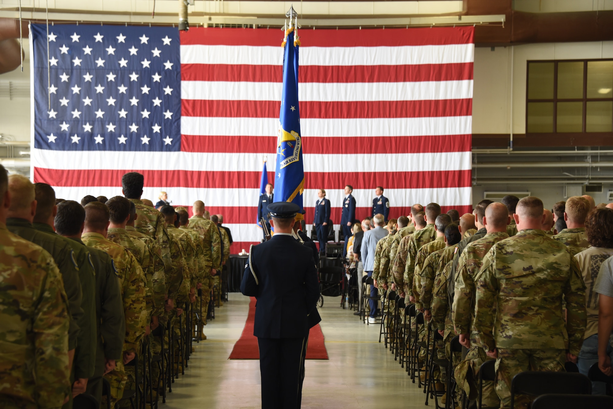 Honor Guard members assigned to the 185th Air Refueling Wing present the colors