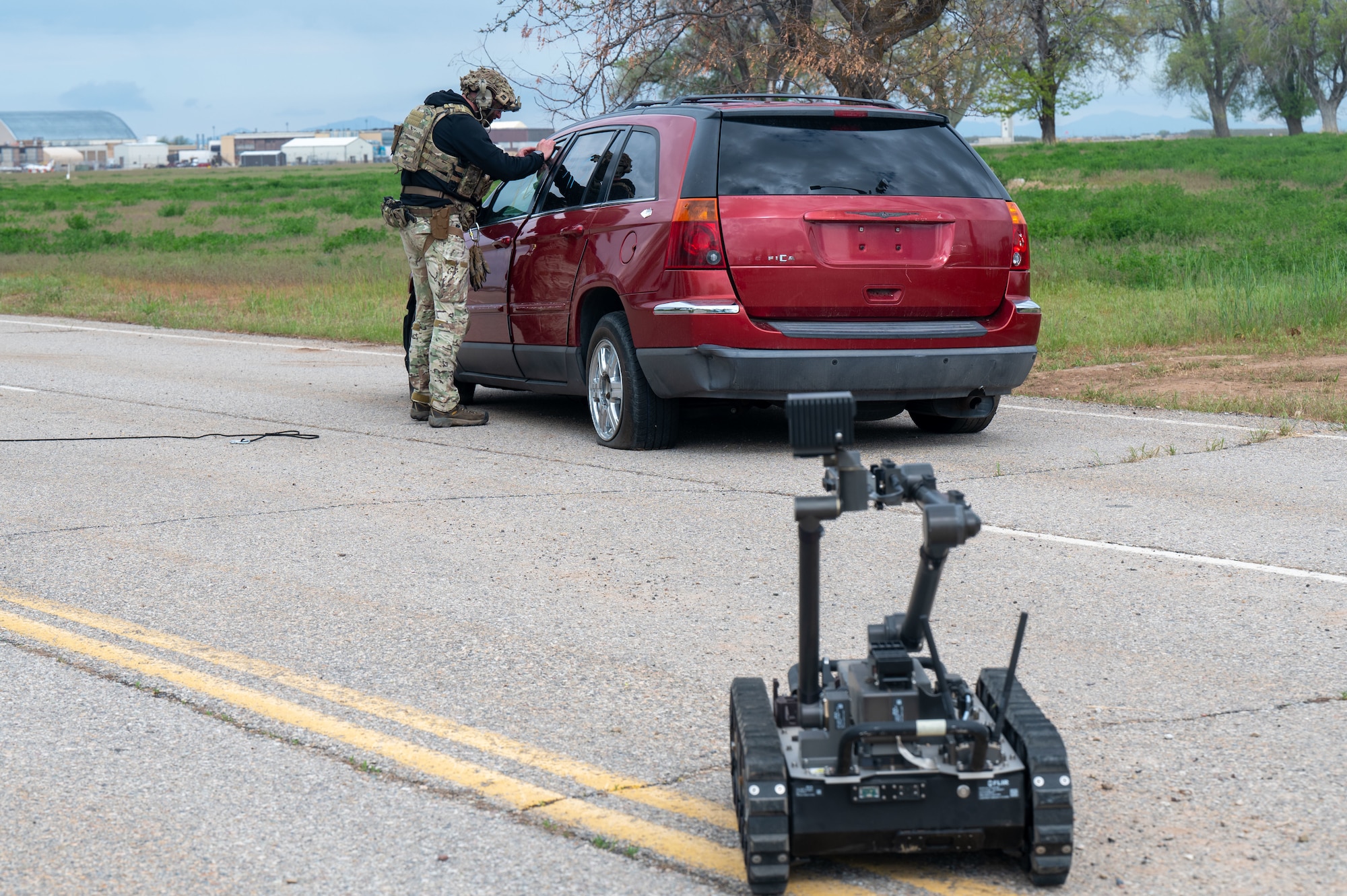 Staff Sgt. David Stephens, 419th Fighter Wing Civil Engineering Squadron, inspects a simulated improvised explosive device during an exercise at Hill Air Force Base, Utah, May 5, 2025.