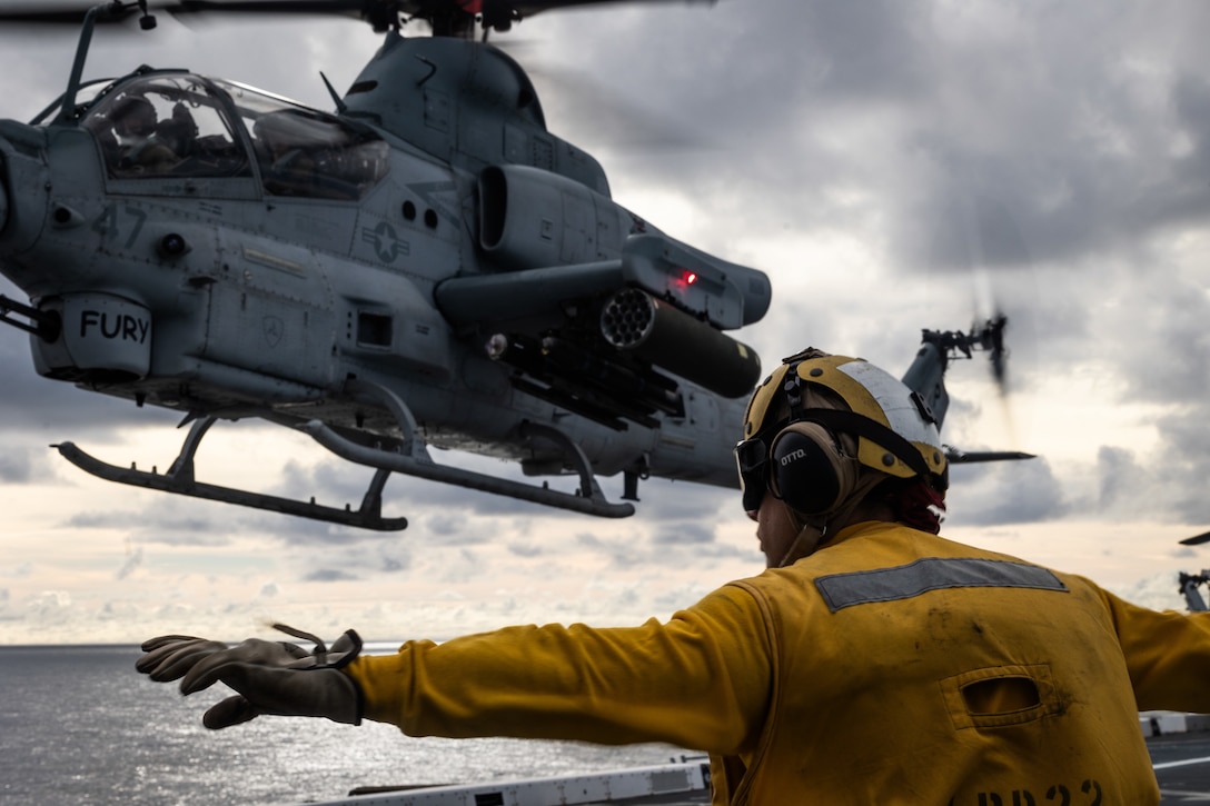 A U.S. Marine Corps AH-1Z Viper helicopter assigned to Marine Medium Tiltrotor Squadron (VMM) 265 (Rein.), 31st Marine Expeditionary Unit, takes off during flight operations aboard amphibious transport dock USS San Diego (LPD 22), in the Philippine Sea, June 6, 2025. Marines and Sailors conducted flight operations in order to expand mission capabilities in support of the 31st MEU. The 31st MEU is operating aboard ships of the USS America Amphibious Ready Group in the 7thFleet area of operations, the U.S. Navy’s largest forward-deployed numbered fleet, and routinely interacts and operates with allies and partners in preserving a free and open Indo-Pacific region. (U.S. Marine Corps photo by Lance Cpl. Raul Sotovilla)