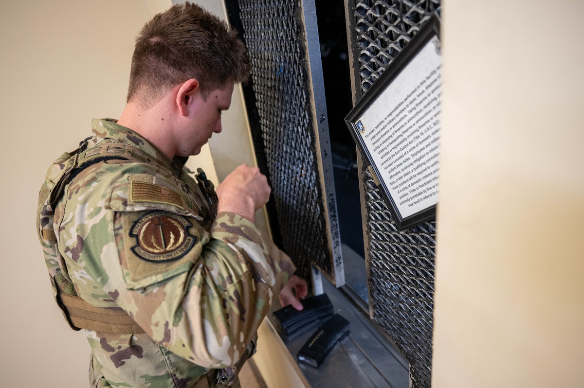 U.S. Air Force Airman 1st Class Nicolas Michka, 35th Security Forces Squadron patrolman, checks-in his service weapon at Misawa Air Base, Japan, June 5, 2025