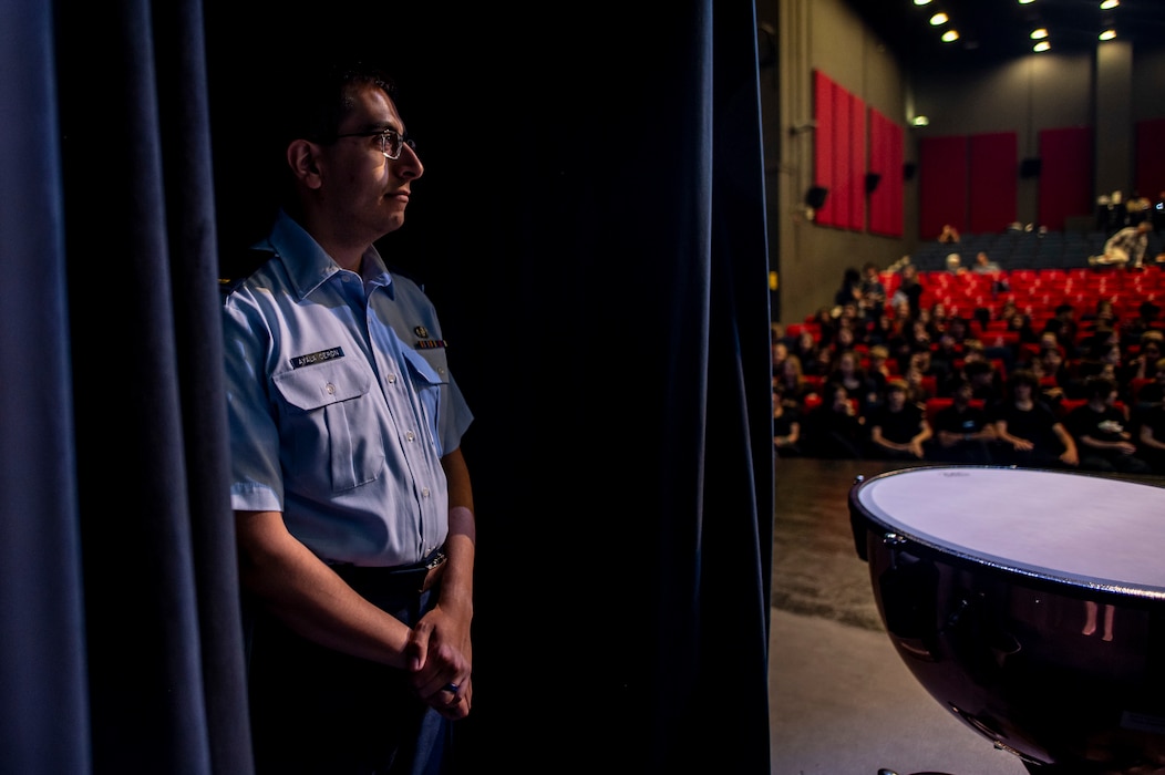 U.S. Air Force 2nd Lt. Nicolas Ayala prepares to conduct a student band during a fine arts festival for the Middle East at the American School of Doha, in Qatar, May 17th, 2025.