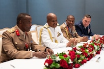 Kenya Defence Forces Gen. C M Kahariri, Chief of the Defence Forces, left, Kenya Defence Forces Maj. Gen. Frederick Leuria, Assistant Chief of the Defence Forces, center, and U.S. Air Force Maj. Gen. Gary Keefe, The Adjutant General, Massachusetts National Guard meet during a bilateral engagement at the 2025 African Chiefs of Defense Conference in Nairobi, Kenya, May 29, 2025.