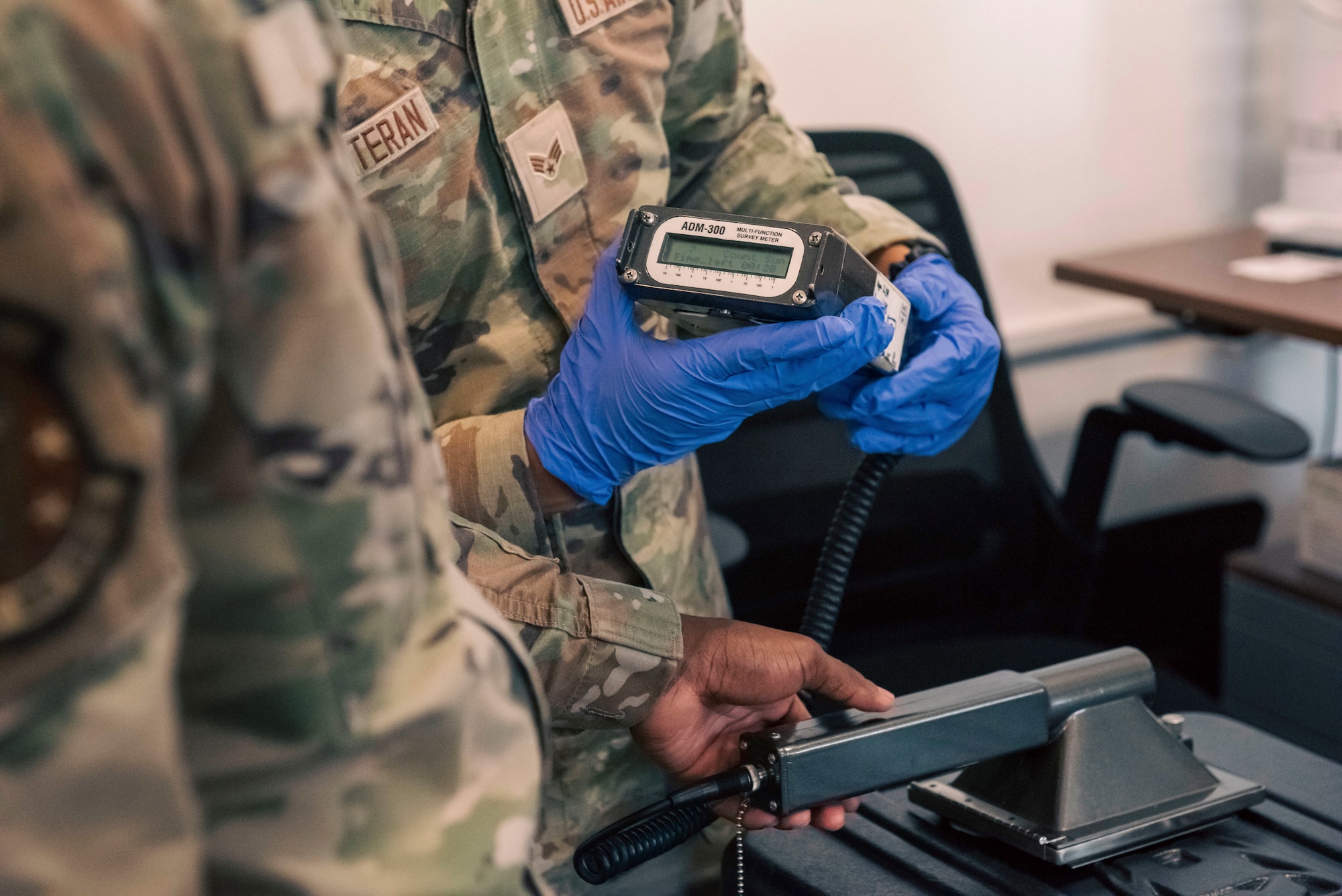 Two U.S. Air Force bioenvironmental engineering personnel assigned to the 86th Operational Medical Readiness Squadron, perform a radiology test at Ramstein Air Base, Germany, June 3, 2025. The bioenvironmental engineering flight conducts water testing and inspections across the installation, focusing on preventive medicine. (U.S. Air Force photo by Senior Airman Sabrina Fuller-Judd)