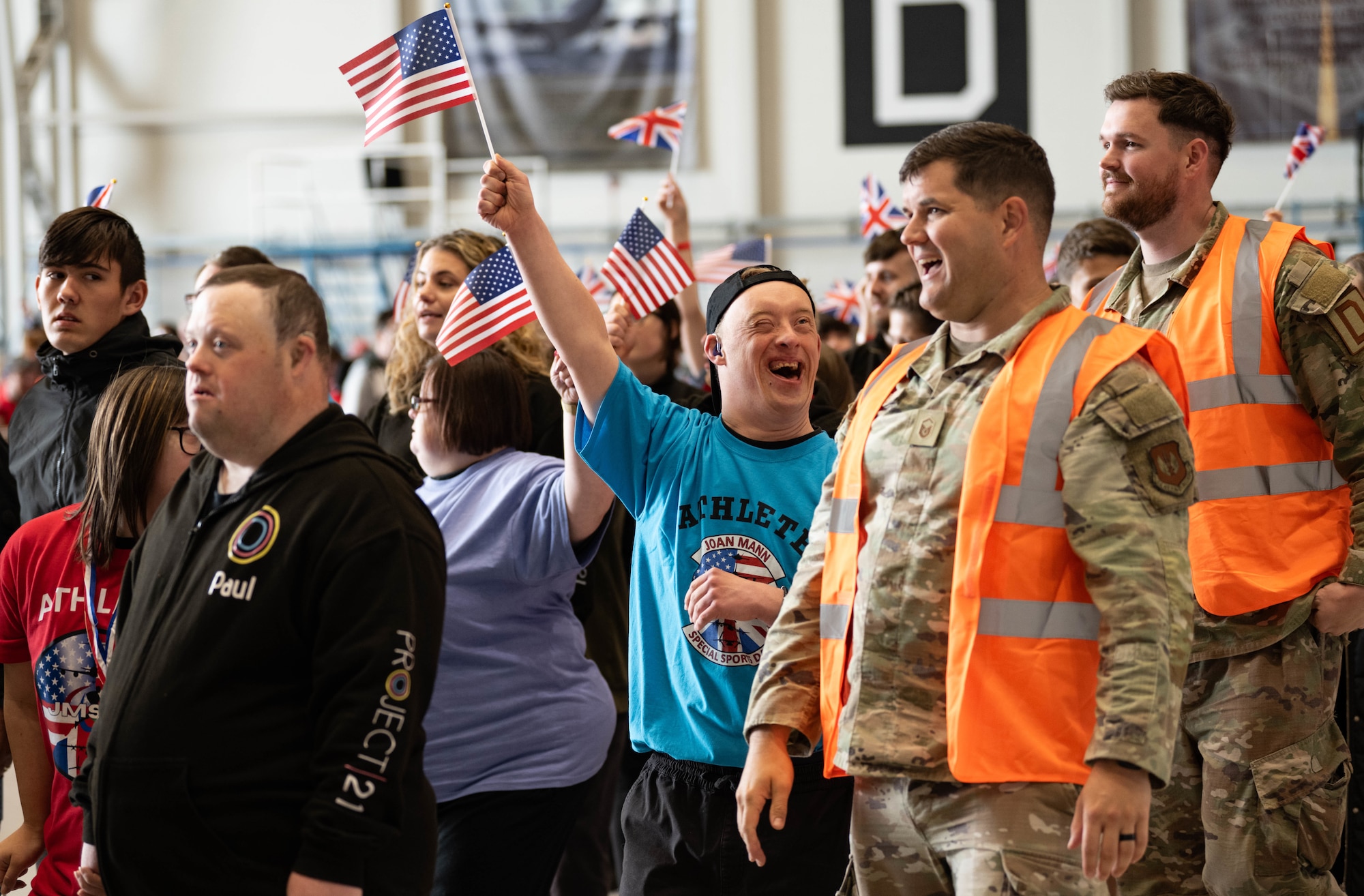 Athletes and volunteers get excited to start the games and participate in the Joan Mann Special Sports Day at RAF Mildenhall, England, June 5, 2025.