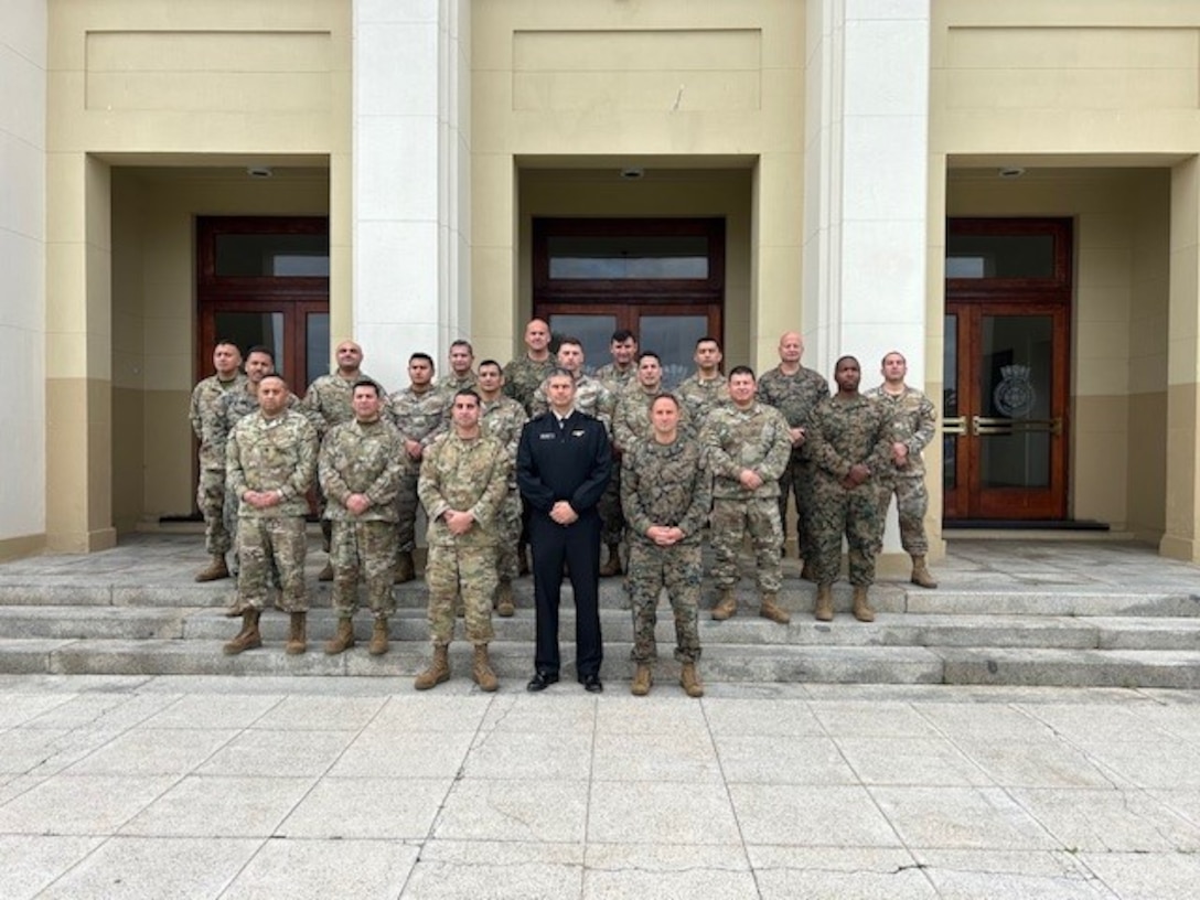 U.S. Marines with Marine Corps Advisor Company A, Force Headquarters Group, Marine Forces Reserve, and Chilean Marines with the Amphibious Expeditionary Brigade, Cuerpo de Infanteria Marina, Armada de Chile, stand for a photo during an operational planning and wargaming subject matter expert exchange at the Academia de Guerra Naval (Naval War College) in Viña del Mar, Chile, June 12, 2024. Chilean and U.S. Marines routinely conduct training exchanges to learn from one another and enhance interoperability and professional development. Courtesy asset.
