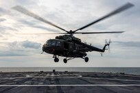 Polish Mi-17 twin-turbine, medium-lift transport helicopter pilots conduct deck landing qualifications aboard the Blue Ridge-class command and control ship USS Mount Whitney (LCC 20) during exercise Baltic Operations 25 (BALTOPS 25) in Klaipeda, Lithuania, June 8, 2025.