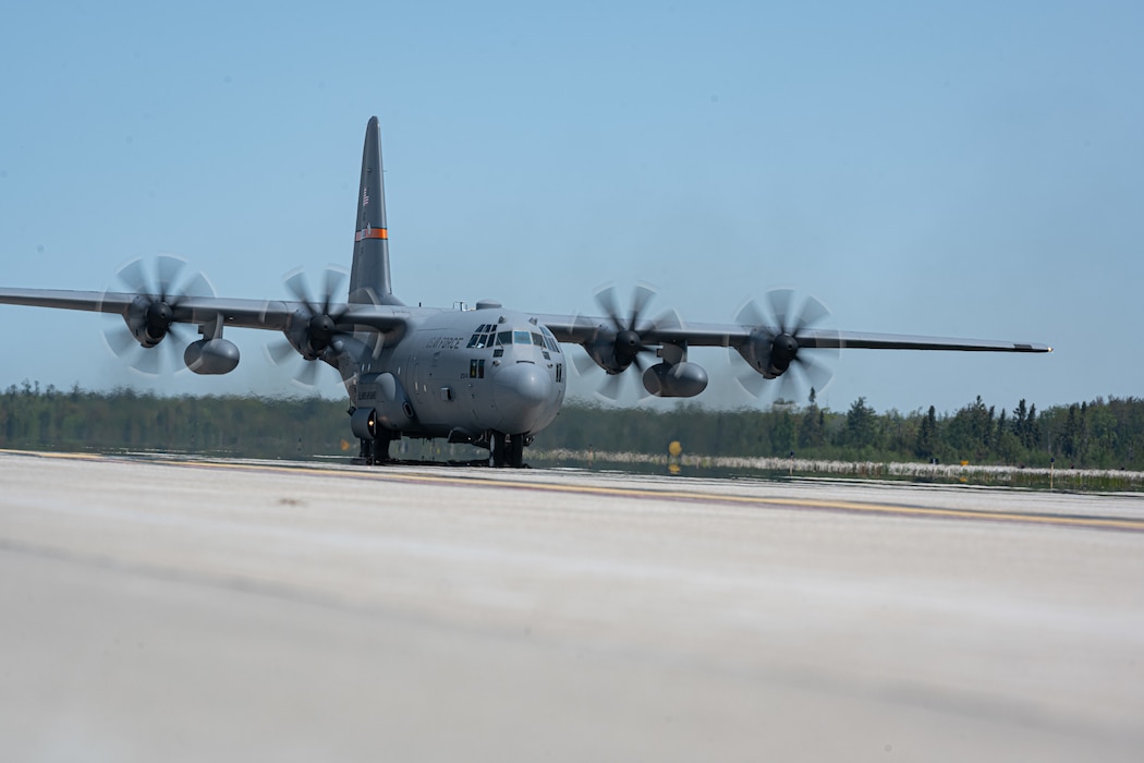 A U.S. Air Force C-130 Hercules aircraft assigned to the 182nd Airlift Wing, Illinois Air National Guard, lands on an airfield during Sentry North Exercise at Alpena Combat Readiness Training Center, Michigan, June 1, 2025. Sentry North 2025 focused on operating in a contested environment with adversary aircraft, electronic jamming, and simulated surface-to-air threats, providing a premier joint training opportunity ensuring participating units are combat-ready and interoperable in operationally limited environments. (U.S. Air National Guard photo by 1st Lt. Eliezer Soto)