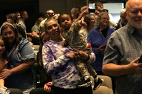 Soldiers with the Illinois Army National Guard’s 232nd Combat Sustainment Support Battalion share heartfelt moments with family and loved ones following a mobilization ceremony