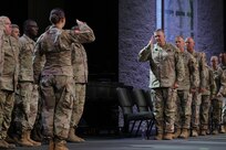 Brig. Gen. Lenny Williams, Assistant Adjutant General – Army and Commander of the Illinois Army National Guard, returns a salute during the mobilization ceremony for the 232nd Combat Sustainment Support Battalion