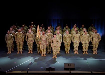 Soldiers of the Illinois Army National Guard’s 232nd Combat Sustainment Support Battalion stand in formation during their mobilization ceremony June 7