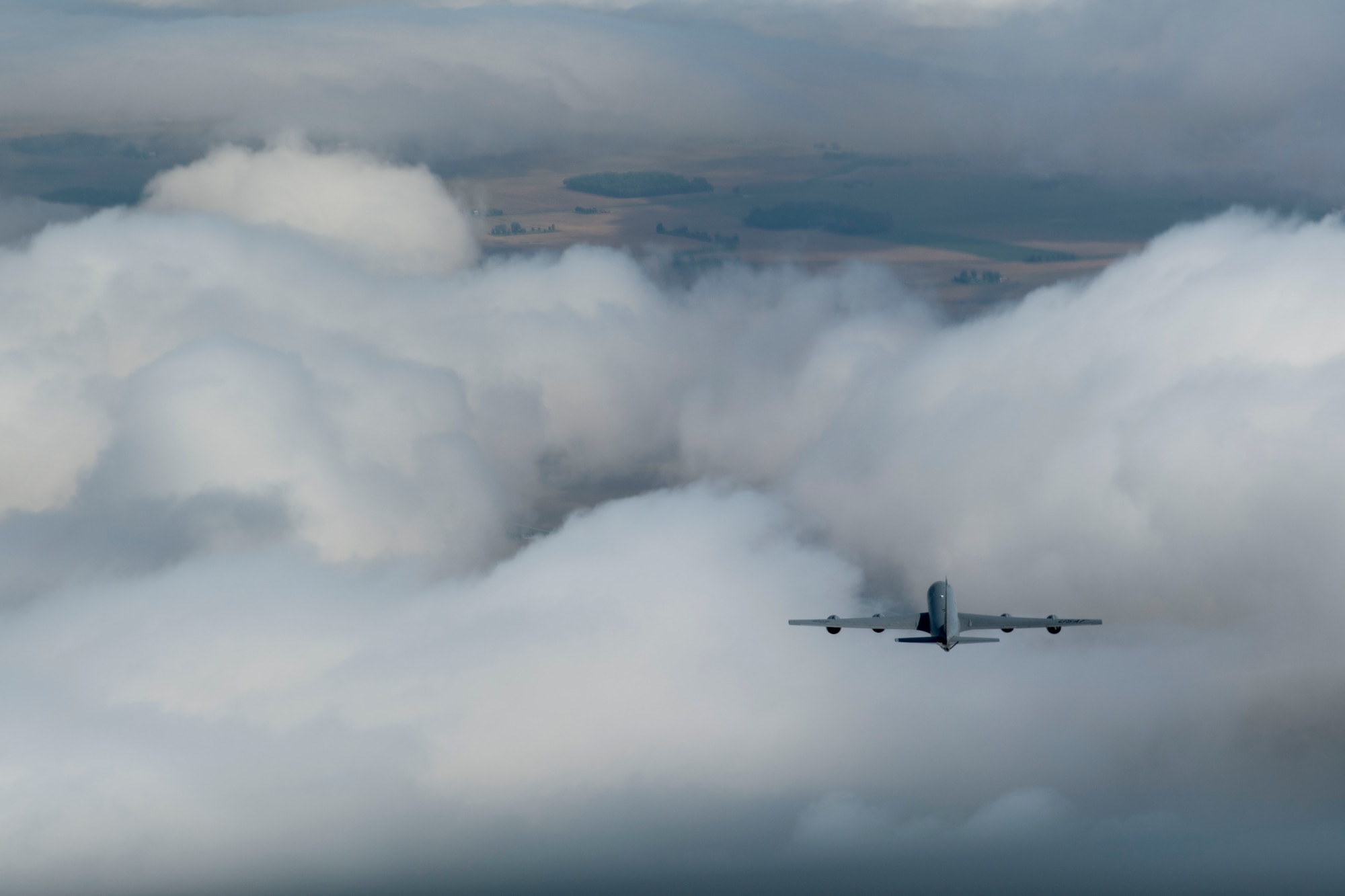 KC-135 Stratotanker flies through clouds