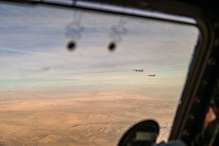 Strategic Asset Gets Tactical: 433rd AW C-5M, Chilean F-16s Team Up for Aerial Maneuvers
