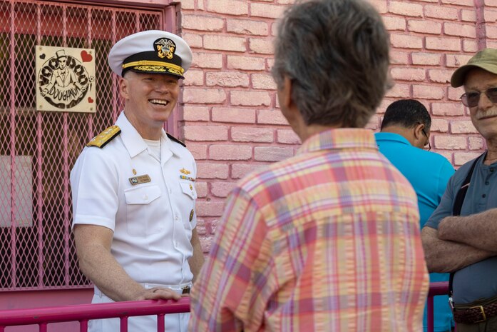 PORTLAND, OREGON (June 7, 2025) – U.S. Navy Vice Adm. John Wade, commander, U.S. 3rd Fleet, interacts with community members during Portland Fleet Week, June 7, 2025. Portland Fleet Week is a time-honored celebration of the sea services and provides an opportunity for the citizens of Oregon to meet Sailors, Marines, and Coast Guardsmen, as well as witness firsthand the latest capabilities of today’s maritime services. (U.S. Marine Corps photo by Sgt. Amelia Kang)