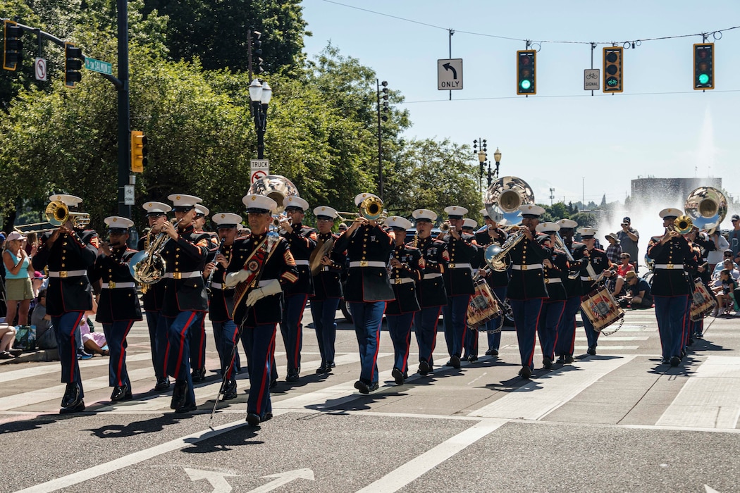 PORTLAND, OREGON (June 7, 2025) –U.S. Marines with Marine Band San Diego, Marine Corps Recruit Depot San Diego, Western Recruiting Region perform at the Grand Floral Parade during Portland Fleet Week, June 7, 2025. Portland Fleet Week is a time-honored celebration of the sea services and provides an opportunity for the citizens of Oregon to meet Sailors, Marines, and Coast Guardsmen, as well as witness firsthand the latest capabilities of today’s maritime services. (U.S. Marine Corps photo by Sgt. Amelia Kang)