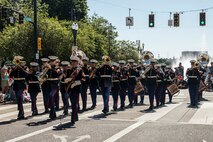 PORTLAND, OREGON (June 7, 2025) –U.S. Marines with Marine Band San Diego, Marine Corps Recruit Depot San Diego, Western Recruiting Region perform at the Grand Floral Parade during Portland Fleet Week, June 7, 2025. Portland Fleet Week is a time-honored celebration of the sea services and provides an opportunity for the citizens of Oregon to meet Sailors, Marines, and Coast Guardsmen, as well as witness firsthand the latest capabilities of today’s maritime services. (U.S. Marine Corps photo by Sgt. Amelia Kang)