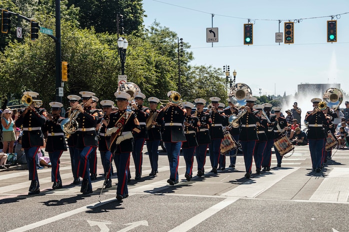 PORTLAND, OREGON (June 7, 2025) –U.S. Marines with Marine Band San Diego, Marine Corps Recruit Depot San Diego, Western Recruiting Region perform at the Grand Floral Parade during Portland Fleet Week, June 7, 2025. Portland Fleet Week is a time-honored celebration of the sea services and provides an opportunity for the citizens of Oregon to meet Sailors, Marines, and Coast Guardsmen, as well as witness firsthand the latest capabilities of today’s maritime services. (U.S. Marine Corps photo by Sgt. Amelia Kang)