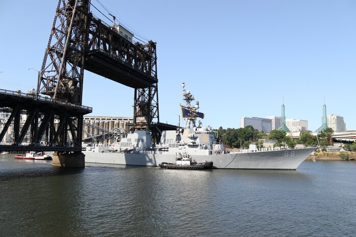 PORTLAND, OREGON (June 3, 2025) – The Arleigh Burke-class guided missile destroyer USS Mustin (DDG 89) arrives for Portland Fleet Week during the 118th Rose Festival, June 3, 2025.  Portland Fleet Week is a time-honored celebration of the sea services and provides an opportunity for the citizens of Oregon to meet Sailors, Marines and Coast Guardsmen, as well as witness firsthand the latest capabilities of today’s maritime services. (U.S. Navy Photo by Mass Communication Specialist 2nd Class Kassandra Alanis)