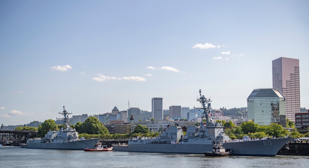 PORTLAND, OREGON (June 3, 2025) – The Arleigh Burke-class guided missile destroyer USS Mustin (DDG 89), right, and the Arleigh Burke-class guided missile destroyer USS Jack H. Lucas (DDG 125) arrive for Portland Fleet Week during the 118th Rose Festival, June 3, 2025. Portland Fleet Week is a time-honored celebration of the sea services and provides an opportunity for the citizens of Oregon to meet Sailors, Marines and Coast Guardsmen, as well as witness firsthand the latest capabilities of today’s maritime services. (U.S. Navy Photo by Mass Communication Specialist 2nd Class Gwendelyn L. Ohrazda)