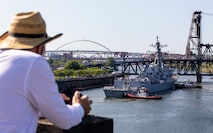 PORTLAND, OREGON (June 3, 2025) – The Arleigh Burke-class (Flight IIA) Aegis guided missile destroyer USS Mustin (DDG 89) arrives for Portland Fleet Week during the 118th Rose Festival, June 3, 2025. Portland Fleet Week is a time-honored celebration of the sea services and provides an opportunity for the citizens of Oregon to meet Sailors, Marines and Coast Guardsmen, as well as witness firsthand the latest capabilities of today’s maritime services. (U.S. Navy Photo by Mass Communication Specialist 2nd Class John A. Miller)
