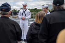 PORTLAND, OREGON (June 5, 2025) – U.S. Navy Sailors, assigned to the Arleigh Burke-class guided missile destroyer USS Jack H. Lucas (DDG 125) speak to tour guest during Portland Fleet Week as part of the 118th Rose Festival, June 5, 2025. Portland Fleet Week is a time-honored celebration of the sea services and provides an opportunity for the citizens of Oregon to meet Sailors, Marines and Coast Guardsmen, as well as witness firsthand the latest capabilities of today’s maritime services. (U.S. Navy Photo by Mass Communication Specialist Seaman Jordan Steis)