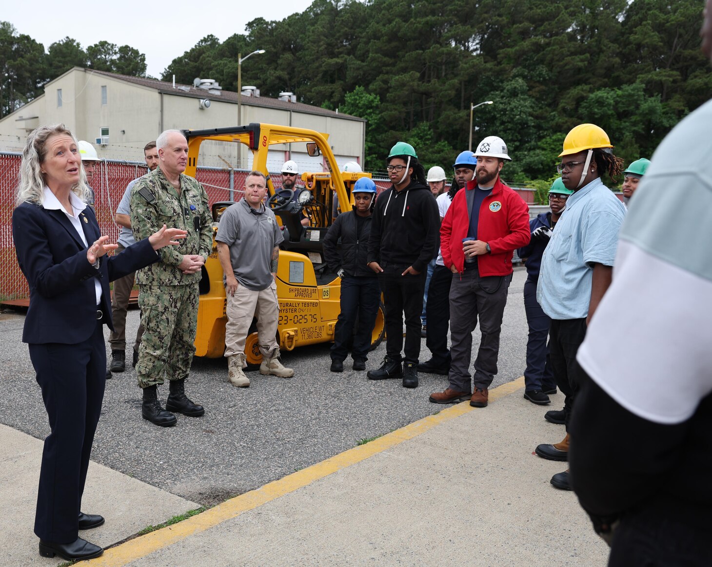 Rep. Jen Kiggans addresses a group of students at Military Sealift Command’s (MSC) Underway Replenishment Center (MUTC), at Joint Expeditionary Base Little Creek in Virginia Beach, Virginia. Kiggans observed the students during an exercise for the Standard Tensioned Replenishment Alongside Method (STREAM) training course, which provides underway replenishment training for more than 600 Civil Service Mariners each year.