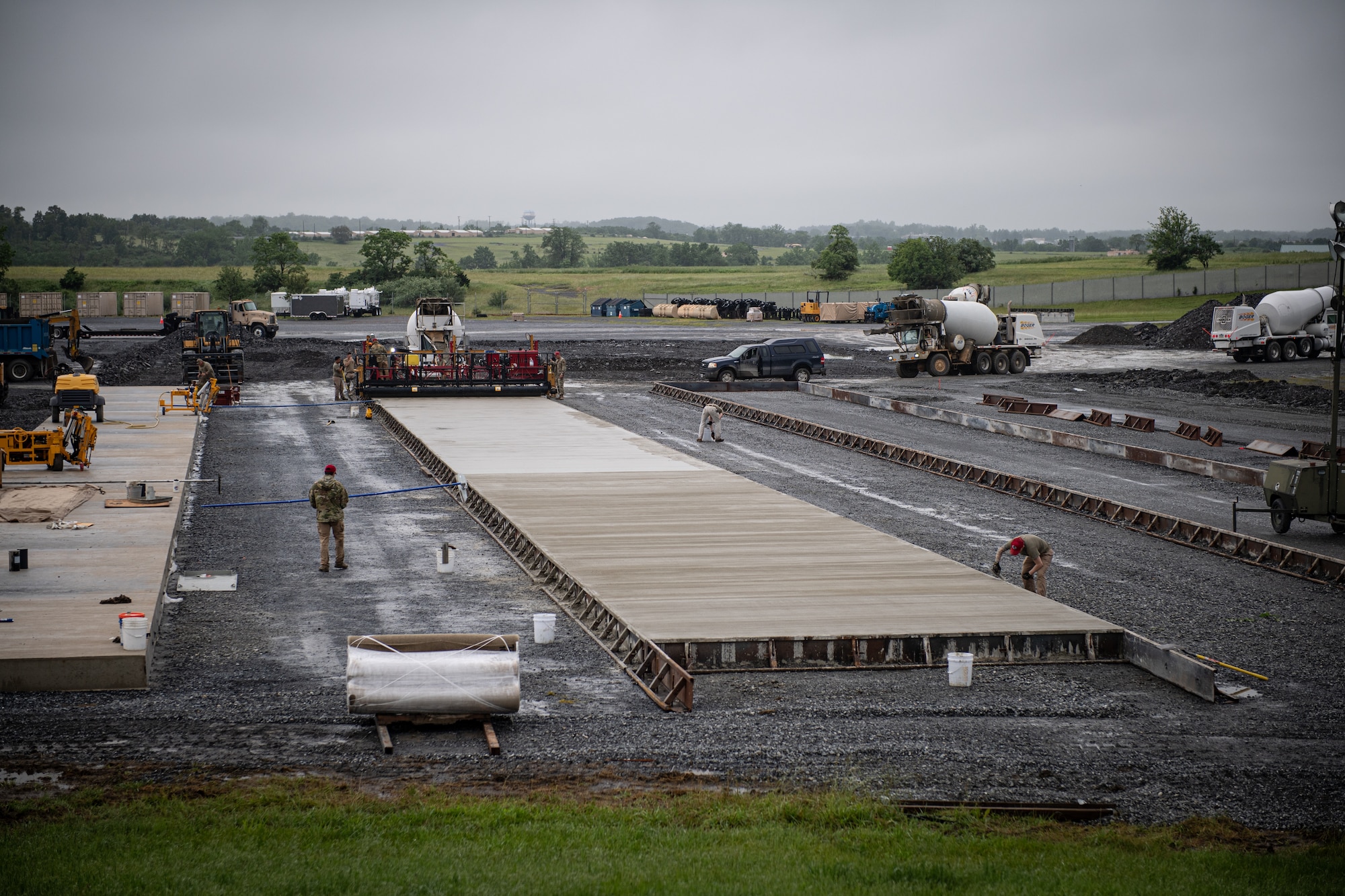 Airmen from various civil engineering specialties construct a Rapid Airfield Damage Repair system at Fort Indiantown Gap, Pennsylvania