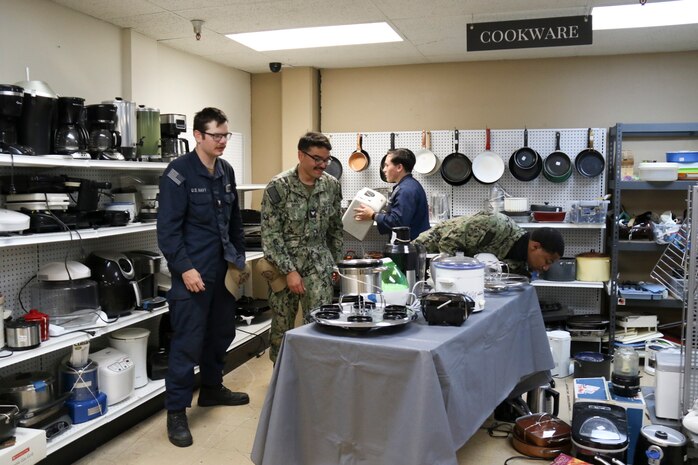 PORTLAND, OREGON (June 7, 2025) – U.S. Navy Sailors volunteer at the Union Gospel Mission Thrift Shop at Portland Fleet Week during the 118th Rose Festival, June 7, 2025.  Portland Fleet Week is a time-honored celebration of the sea services and provides an opportunity for the citizens of Oregon to meet Sailors, Marines and Coast Guardsmen, as well as witness firsthand the latest capabilities of today’s maritime services. (U.S. Navy Photo by Mass Communication Specialist 2nd Class Kassandra Alanis)