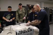 PORTLAND, OREGON (June 7, 2025) – U.S. Navy Sailors volunteer during a dinner service at the Burnside Shelter (Portland Rescue Mission) during Portland Fleet Week during the 118th Rose Festival, June 7, 2025. Portland Fleet Week is a time-honored celebration of the sea services and provides an opportunity for the citizens of Oregon to meet Sailors, Marines and Coast Guardsmen, as well as witness firsthand the latest capabilities of today’s maritime services. (U.S. Navy Photo by Mass Communication Specialist 2nd Class Kassandra Alanis)