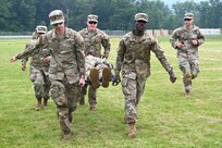 Members of the District of Columbia Army National Guard participate in the O’Neill Competition at Fort Indiantown Gap, PA, on June 6, 2025. The event pushed more than 250 participants through a grueling day of military fundamentals—from ruck marches and weapons qualification to medical tasks and vehicle maintenance—designed to unify and strengthen the Warrior Ethos. The competition was a tribute to D-Day (Operation Overlord) and the legacy of LTC John C. O’Neill, a World War II combat engineer and D.C. Guardsman who helped breach enemy defenses on Omaha Beach in 1944. (U.S. Army National Guard photo by Master Sgt. Arthur M. Wright)