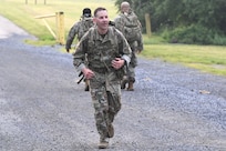 Members of the District of Columbia Army National Guard participate in the O’Neill Competition at Fort Indiantown Gap, PA, on June 6, 2025. The event pushed more than 250 participants through a grueling day of military fundamentals—from ruck marches and weapons qualification to medical tasks and vehicle maintenance—designed to unify and strengthen the Warrior Ethos. The competition was a tribute to D-Day (Operation Overlord) and the legacy of LTC John C. O’Neill, a World War II combat engineer and D.C. Guardsman who helped breach enemy defenses on Omaha Beach in 1944. (U.S. Army National Guard photo by Master Sgt. Arthur M. Wright)