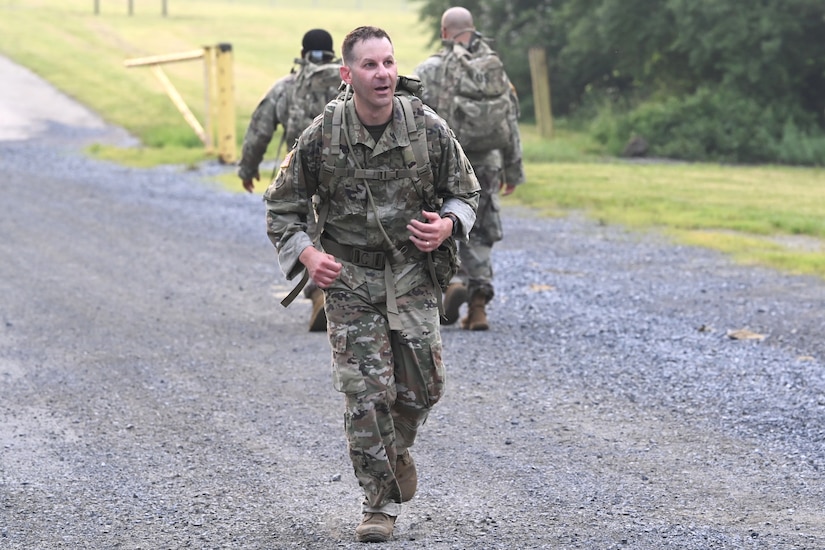Members of the District of Columbia Army National Guard participate in the O’Neill Competition at Fort Indiantown Gap, PA, on June 6, 2025. The event pushed more than 250 participants through a grueling day of military fundamentals—from ruck marches and weapons qualification to medical tasks and vehicle maintenance—designed to unify and strengthen the Warrior Ethos. The competition was a tribute to D-Day (Operation Overlord) and the legacy of LTC John C. O’Neill, a World War II combat engineer and D.C. Guardsman who helped breach enemy defenses on Omaha Beach in 1944. (U.S. Army National Guard photo by Master Sgt. Arthur M. Wright)