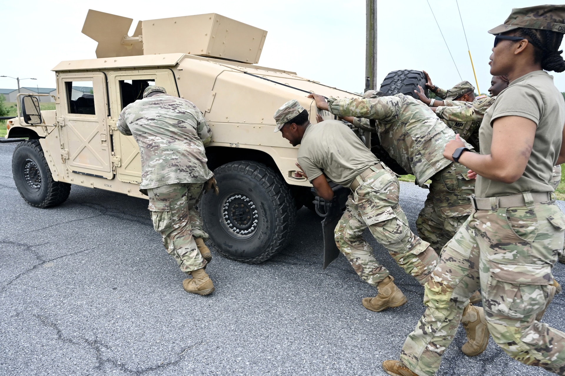 Members of the District of Columbia Army National Guard participate in the O’Neill Competition at Fort Indiantown Gap, PA, on June 6, 2025. The event pushed more than 250 participants through a grueling day of military fundamentals—from ruck marches and weapons qualification to medical tasks and vehicle maintenance—designed to unify and strengthen the Warrior Ethos. The competition was a tribute to D-Day (Operation Overlord) and the legacy of LTC John C. O’Neill, a World War II combat engineer and D.C. Guardsman who helped breach enemy defenses on Omaha Beach in 1944. (U.S. Army National Guard photo by Master Sgt. Arthur M. Wright)