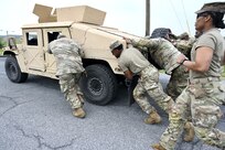 Members of the District of Columbia Army National Guard participate in the O’Neill Competition at Fort Indiantown Gap, PA, on June 6, 2025. The event pushed more than 250 participants through a grueling day of military fundamentals—from ruck marches and weapons qualification to medical tasks and vehicle maintenance—designed to unify and strengthen the Warrior Ethos. The competition was a tribute to D-Day (Operation Overlord) and the legacy of LTC John C. O’Neill, a World War II combat engineer and D.C. Guardsman who helped breach enemy defenses on Omaha Beach in 1944. (U.S. Army National Guard photo by Master Sgt. Arthur M. Wright)