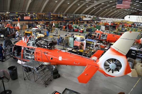 Multiple Coast Guard MH-65 Dolphin helicopters are worked on daily at the Coast Guard Aviation Logistics Center (ALC) located on Coast Guard Base Elizabeth City in Elizabeth City, North Carolina, Sep. 20, 2023. The maintenance completed here consists of a complete tear down, inspection, and repair of all 204 U.S. Coast Guard aircraft on a four year recurring schedule. (U.S. Coast Guard Photo by Petty Officer 2nd Class Ryan L. Noel)