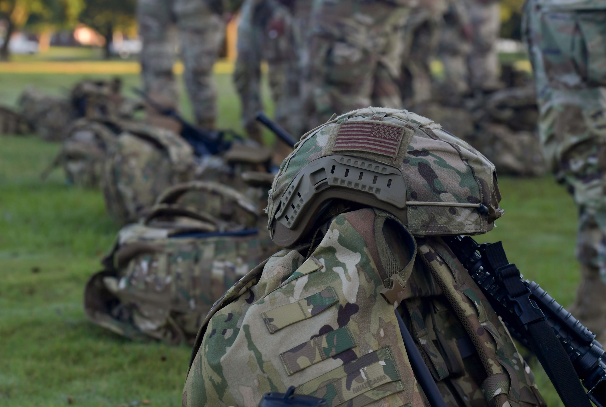 Senior Airman Tyron Bennett, 81st Security Forces Squadron visitors center control clerk, participates in shoot, move and communicate tactics during Warrior Day