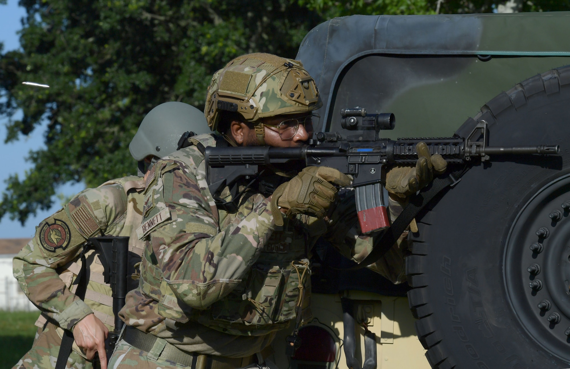 Senior Airman Tyron Bennett, 81st Security Forces Squadron visitors center control clerk, participates in shoot, move and communicate tactics during Warrior Day