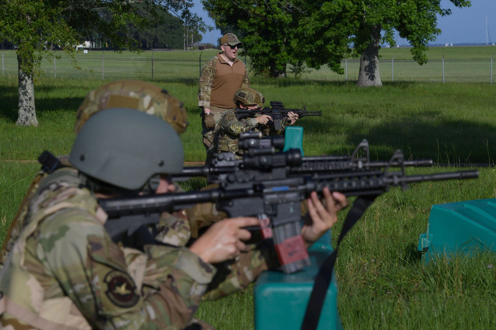 Keesler Air Force Base personnel participate in shoot, move and communicate tactics during Warrior Day