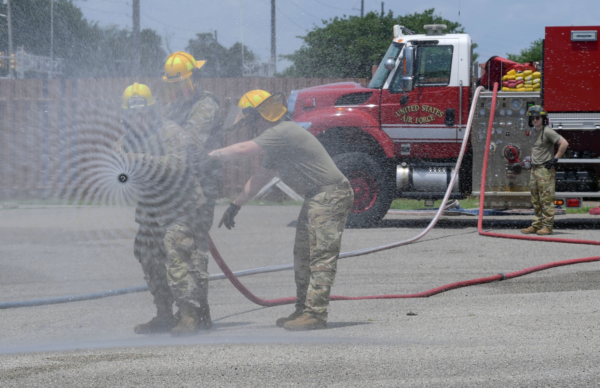 Keesler Air Force Base personnel participate in fire operations exercises during Warrior Day