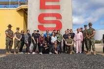 Marines and educators with Recruiting Station Oklahoma City, pose for a group photo during the 2025 Educators Workshop at Marine Corps Recruit Depot San Diego, California, May 1, 2025. The Educators Workshop program provides selected educators and influential community members with an experiential opportunity to see how the Marine Corps transforms young men and women into Marines. Attendees receive current information regarding Marine Corps training practices, military job skills, service opportunities, military lifestyle, and educational benefits available to Marines. (U.S. Marine Corps photo by Staff Sgt. Lennon Dregoiw)