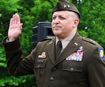 Maj. Gen. Justin Osberg takes the Oath of Office during his promotion ceremony to major general, June 7