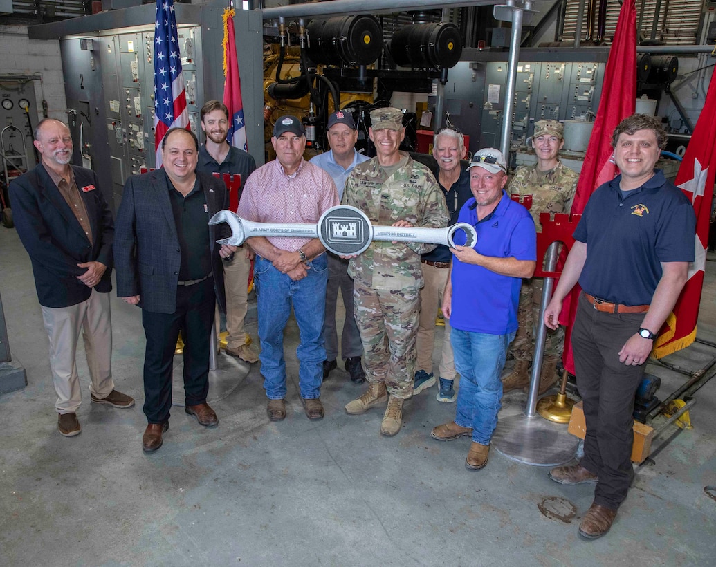 Project Manager Jairus Stroupe and his outstanding DD17 Pumping Plane Engine Replacement Project Delivery Team recently reached the Project Completion milestone with our partners, Drainage District 17 of Mississippi County, Arkansas, and contractor A&H-Ambica JV, LLC. 

This very important $5.1M project replaced all three DD17 Pumping Plant engines. The DD17 Pumping Plant, located near Blytheville, Arkansas, serves to pump rainwater over the St. Francis levee system during periods of flooding. This pumping plant is part of the broader efforts by the Memphis District to manage water levels and prevent flood damage in the area.

The 700 cubic feet per second Pumping Plant, within the St. Francis Basin, protects over 30 square miles in Mississippi County, Arkansas.  The original Waukesha engines that were replaced had been in service since the plant started operation in 1981.  Engine replacement was critical since Waukesha engines are obsolete with replacement parts unavailable.  The engines were replaced with modern 1,000 horsepower Caterpillar engines.