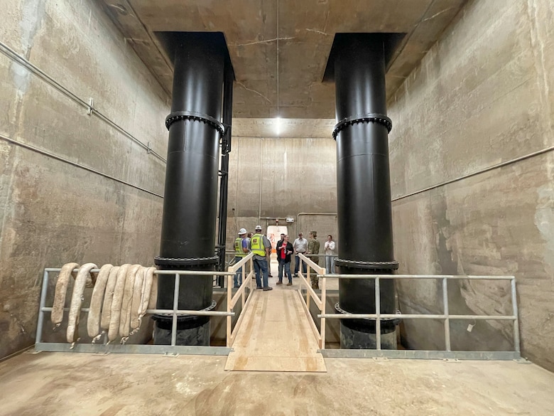 Project Manager Jairus Stroupe and his outstanding DD17 Pumping Plane Engine Replacement Project Delivery Team recently reached the Project Completion milestone with our partners, Drainage District 17 of Mississippi County, Arkansas, and contractor A&H-Ambica JV, LLC. 

This very important $5.1M project replaced all three DD17 Pumping Plant engines. The DD17 Pumping Plant, located near Blytheville, Arkansas, serves to pump rainwater over the St. Francis levee system during periods of flooding. This pumping plant is part of the broader efforts by the Memphis District to manage water levels and prevent flood damage in the area.

The 700 cubic feet per second Pumping Plant, within the St. Francis Basin, protects over 30 square miles in Mississippi County, Arkansas.  The original Waukesha engines that were replaced had been in service since the plant started operation in 1981.  Engine replacement was critical since Waukesha engines are obsolete with replacement parts unavailable.  The engines were replaced with modern 1,000 horsepower Caterpillar engines.