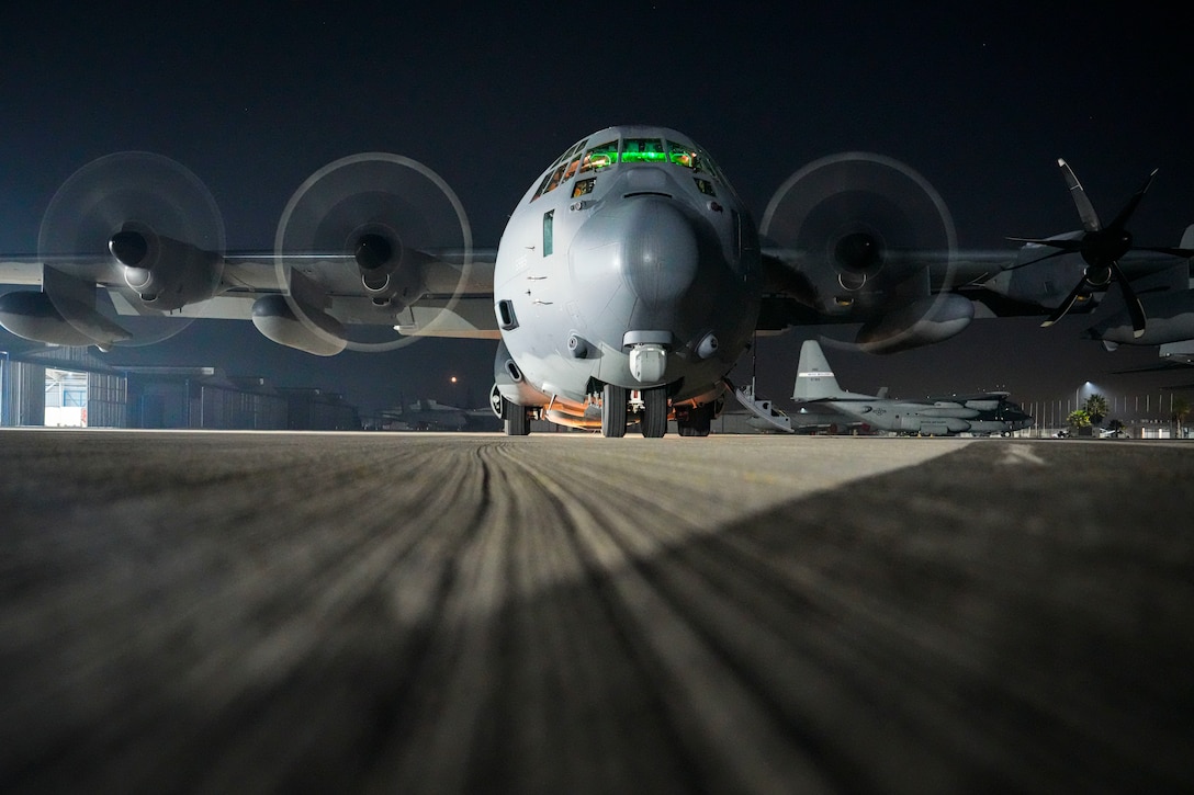 A military plane prepares for takeoff during a training exercise