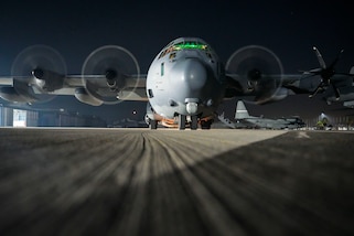 A military plane prepares for takeoff during a training exercise