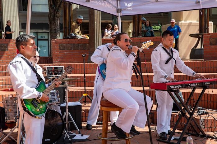 PORTLAND, OREGON (June 6, 2025) – U.S. Navy Band Northwest “Protocol Combo” performs at Pioneer Courthouse Square during Portland Fleet Week, June 6, 2025. Portland Fleet Week is a time-honored celebration of the sea services and provides an opportunity for the citizens of Oregon to meet Sailors, Marines and Coast Guardsmen, as well as witness firsthand the latest capabilities of today’s maritime services. (U.S. Navy Photo by Mass Communication Specialist 2nd Class John A. Miller)