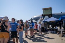 Beale Air & Space Expo attendees wait in line to enter a KC-135 Stratotanker at Beale Air Force Base, California, June 7, 2025.