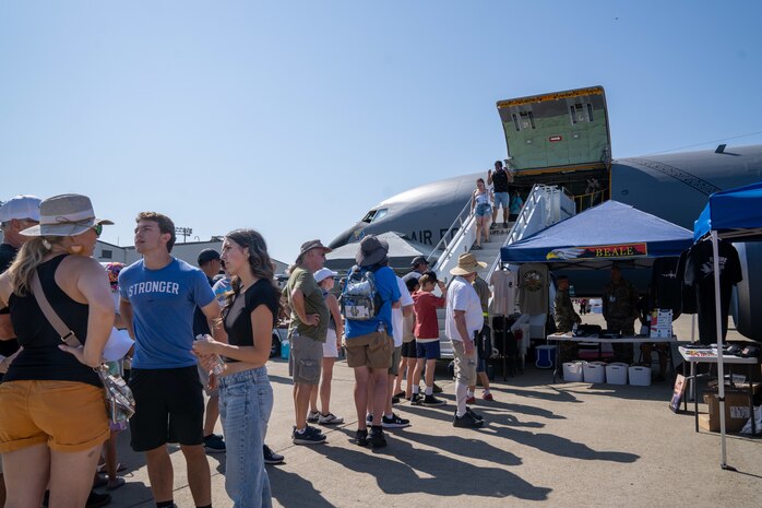 Beale Air & Space Expo attendees wait in line to enter a KC-135 Stratotanker at Beale Air Force Base, California, June 7, 2025.